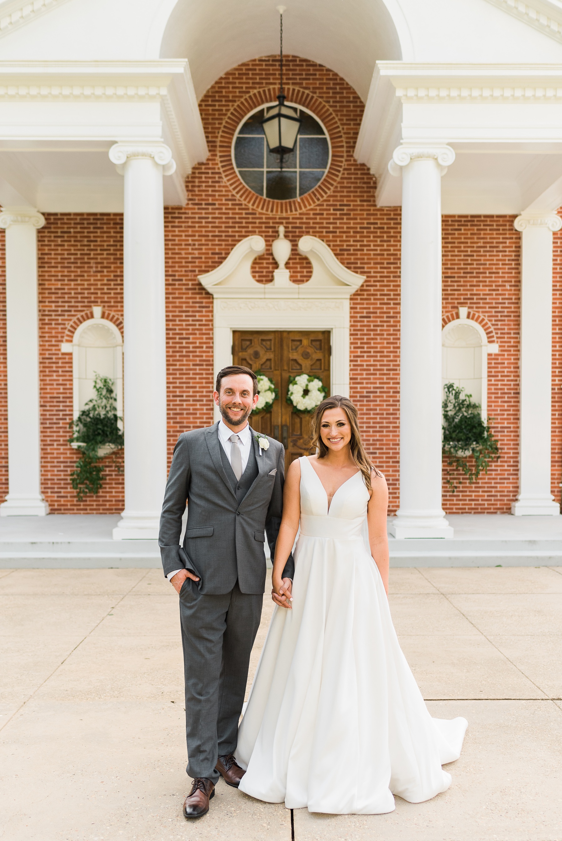 Bride and Groom Classic Portrait in front of Church
