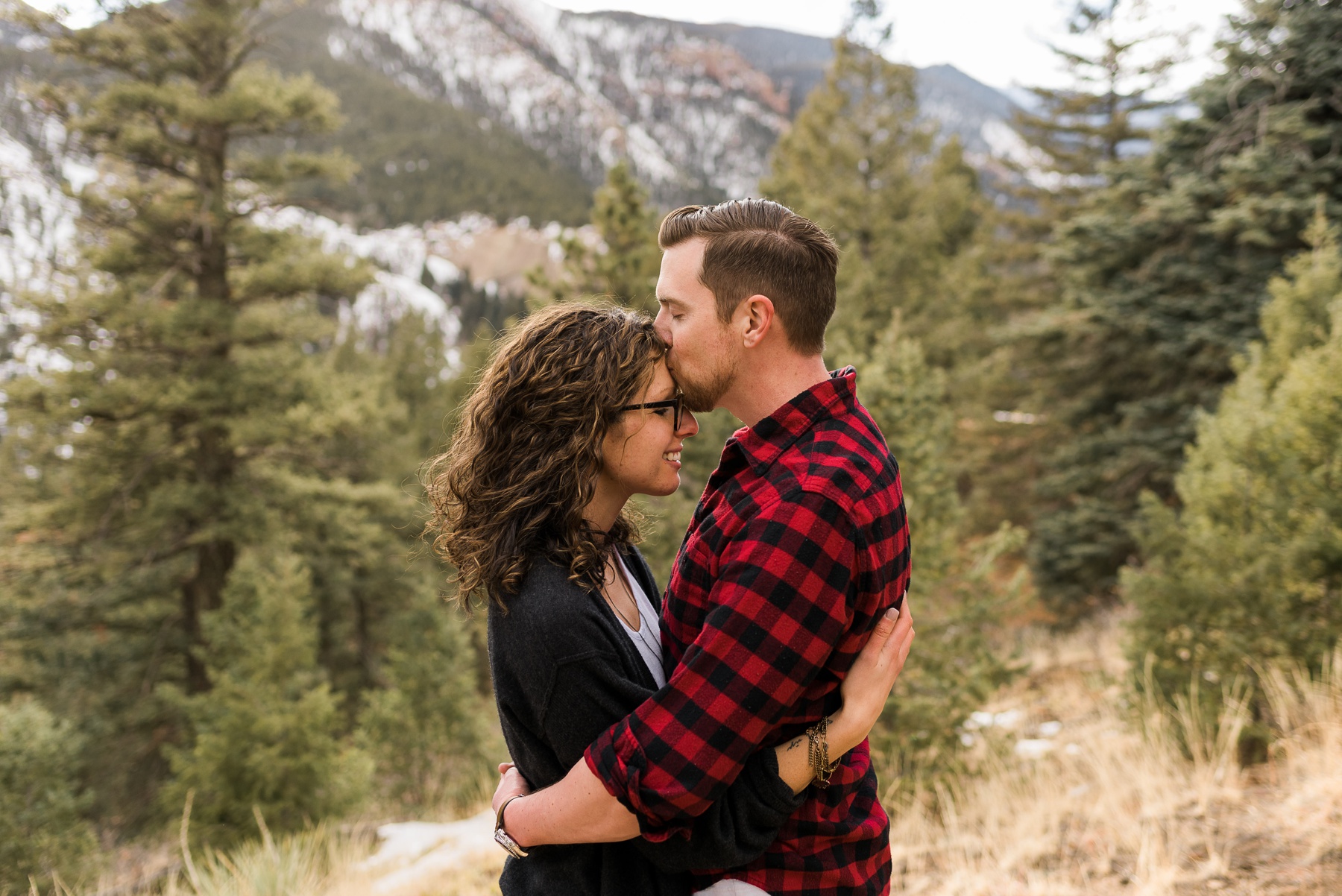 Forehead kiss for engagement photos