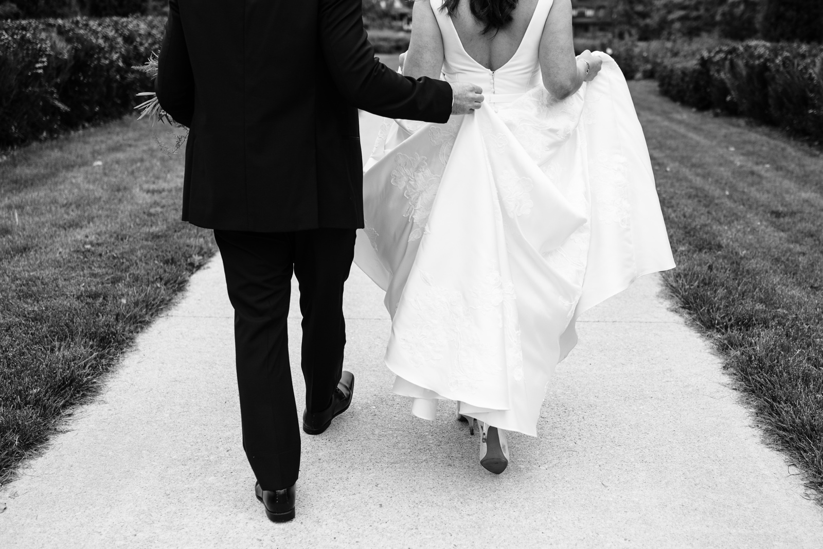 Feet of groom and bride walking