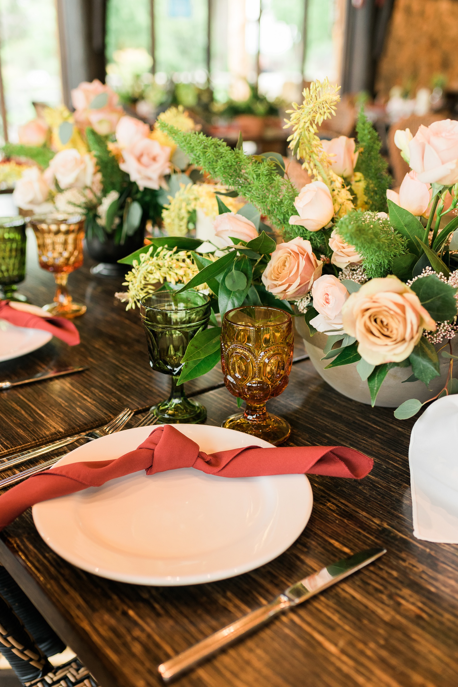 Table details of plate and floral arrangement