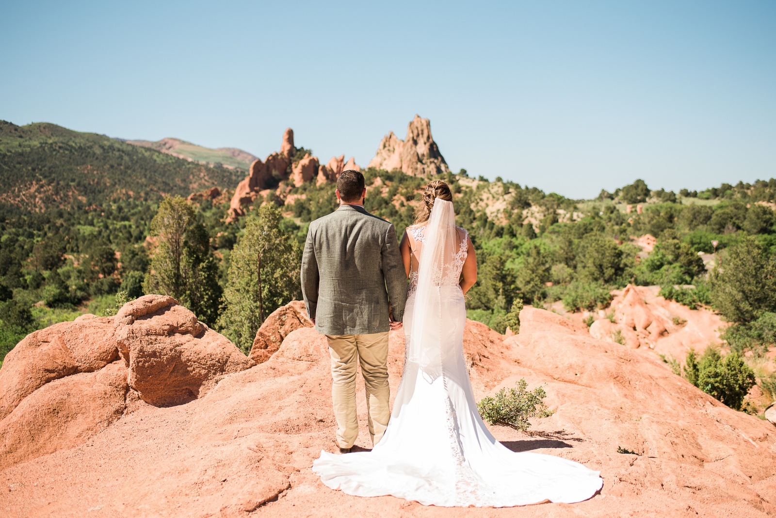 Bride and Groom looking at Garden of the Gods